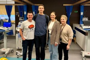 Stem cell donor arriving at hospital with partner on donation day