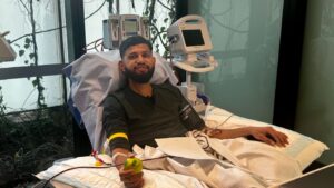 Stem cell donor donating through apheresis after four days of G-CSF injections