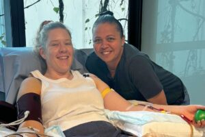 Abbey and her partner Kim together during Abbey's stem cell donation