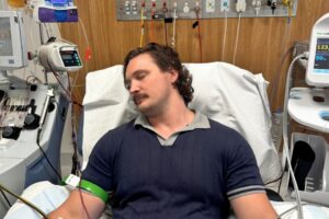 Stefan asleep in the apheresis chair at Concord Hospital